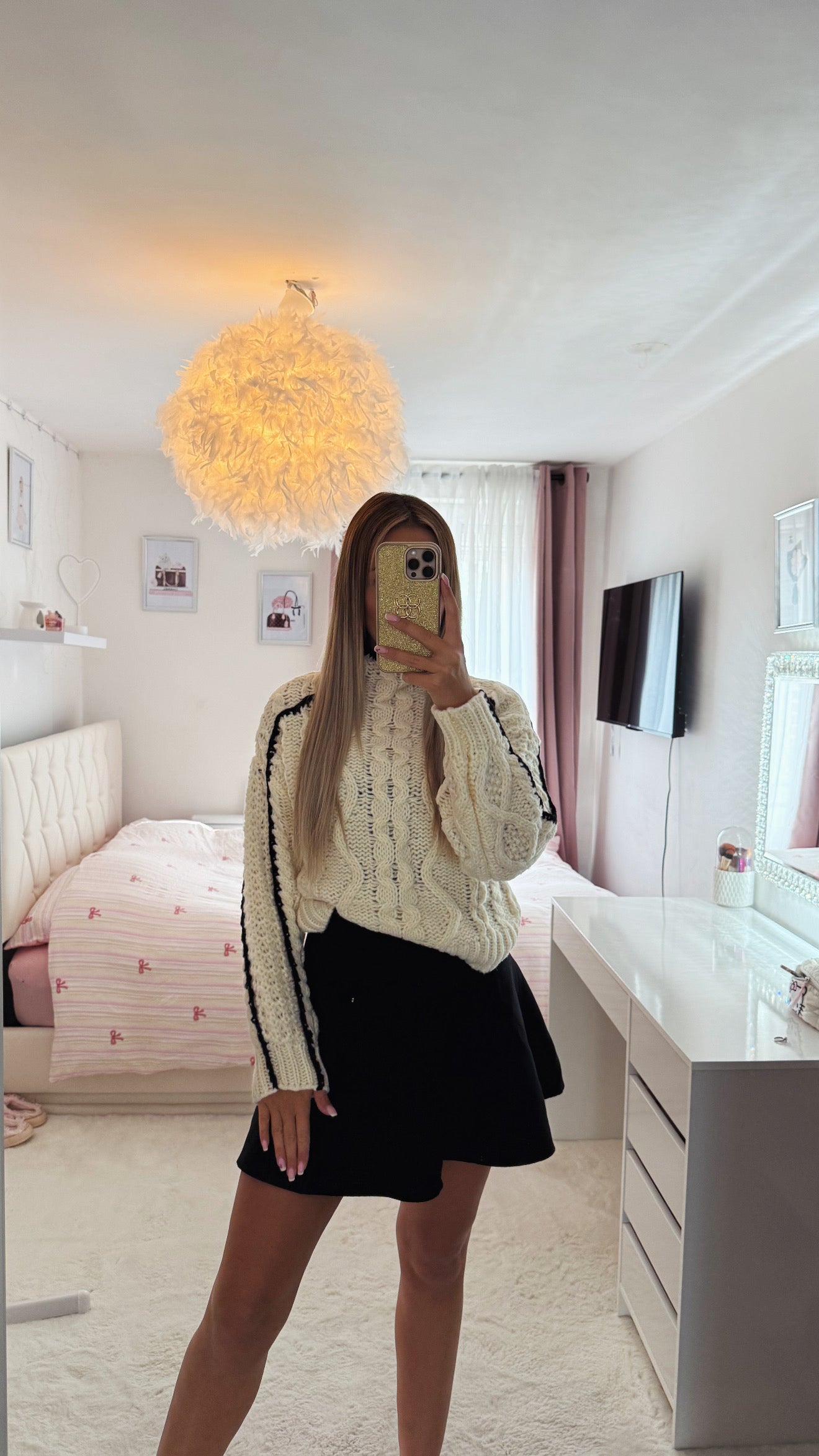 Pull torsadé à col montant