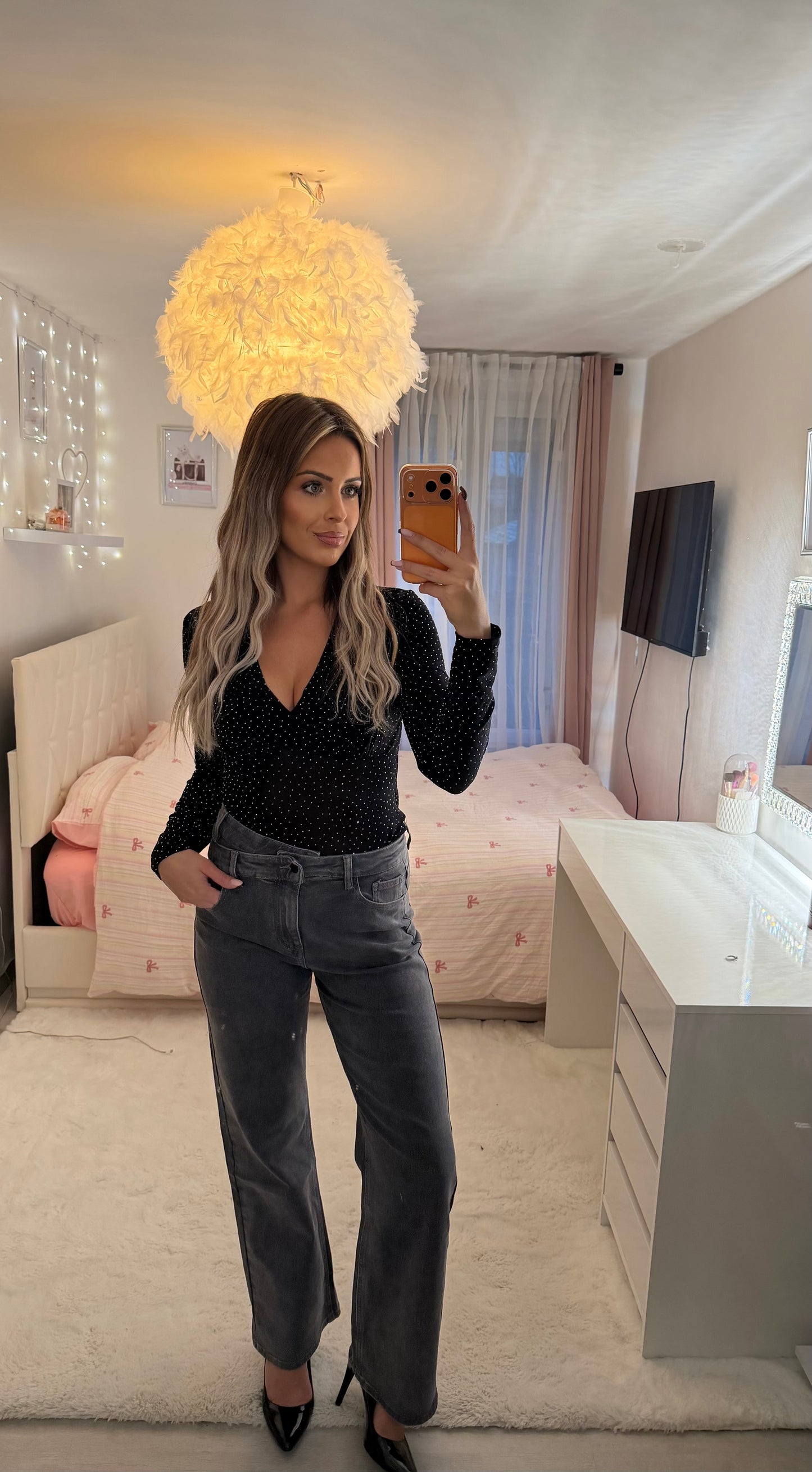 Jeans droit à bouton décalé