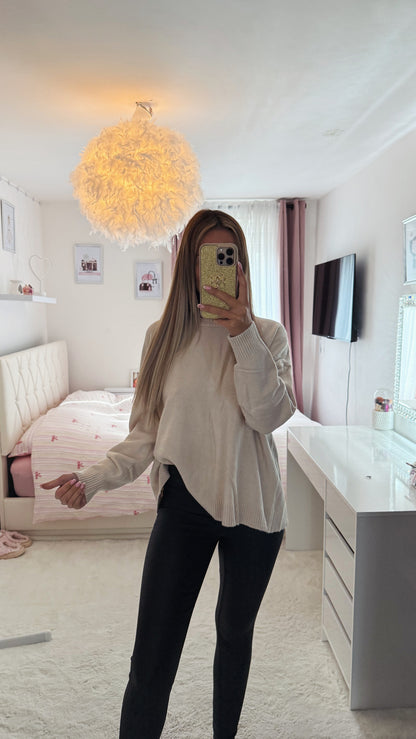 Pull noeuds papillons dos